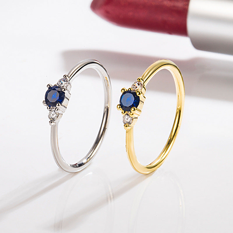 Exquisiter und kleiner blauer Diamant 14K Goldring leichter, einfacher Zirkon