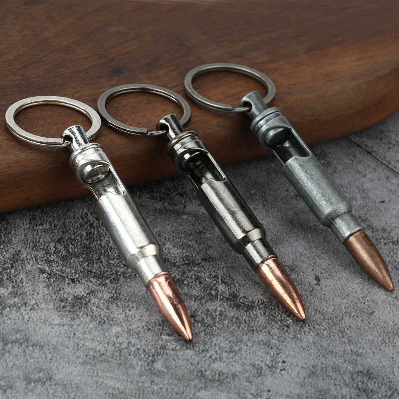 Llaveros de metal con abrebotellas tipo bala, colgante creativo