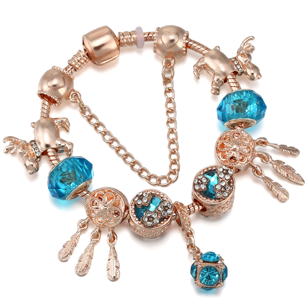 Pulsera de mujer con dije de borla magnética color oro rosado