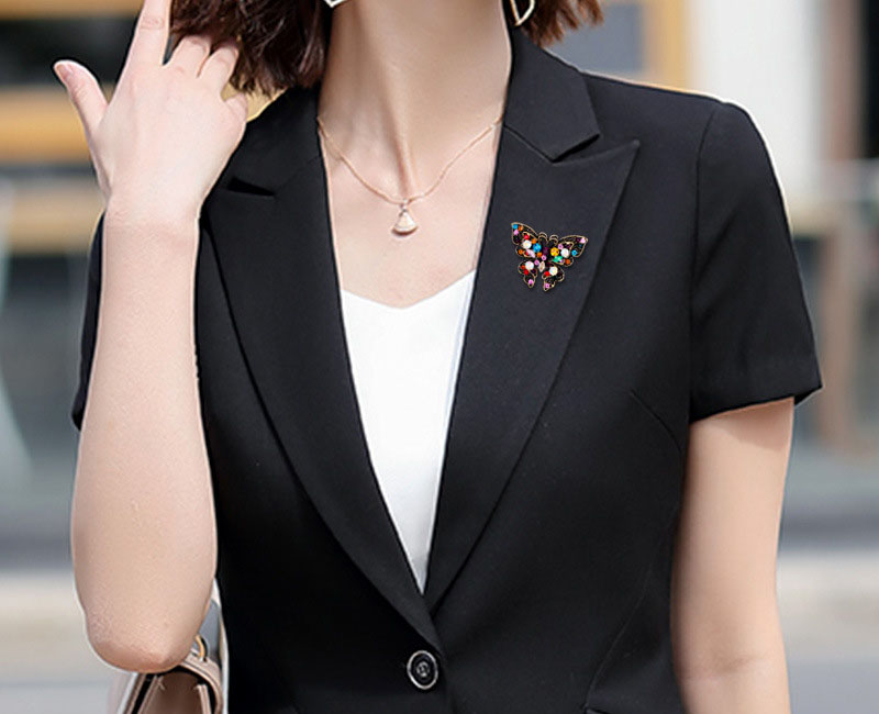 Broche de mariposa de moda con diamantes de imitación de colores