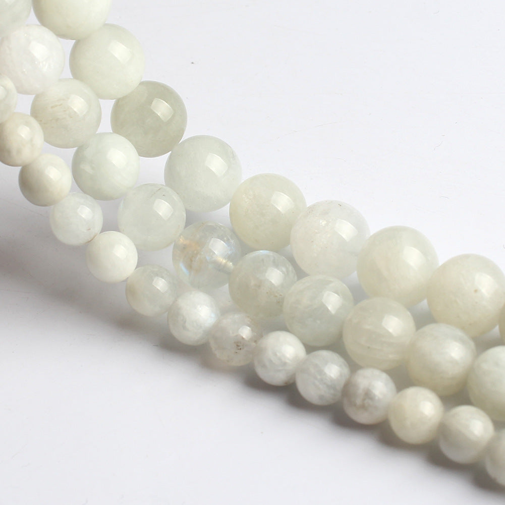 Accesorios de joyería de cuentas de piedra lunar azul blanca