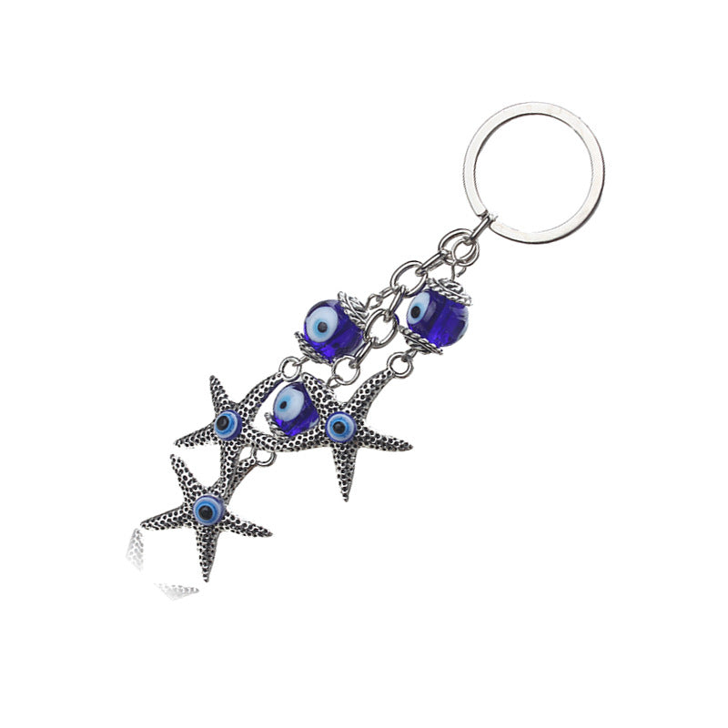 Llavero de estrella de mar, pavo, ojo azul