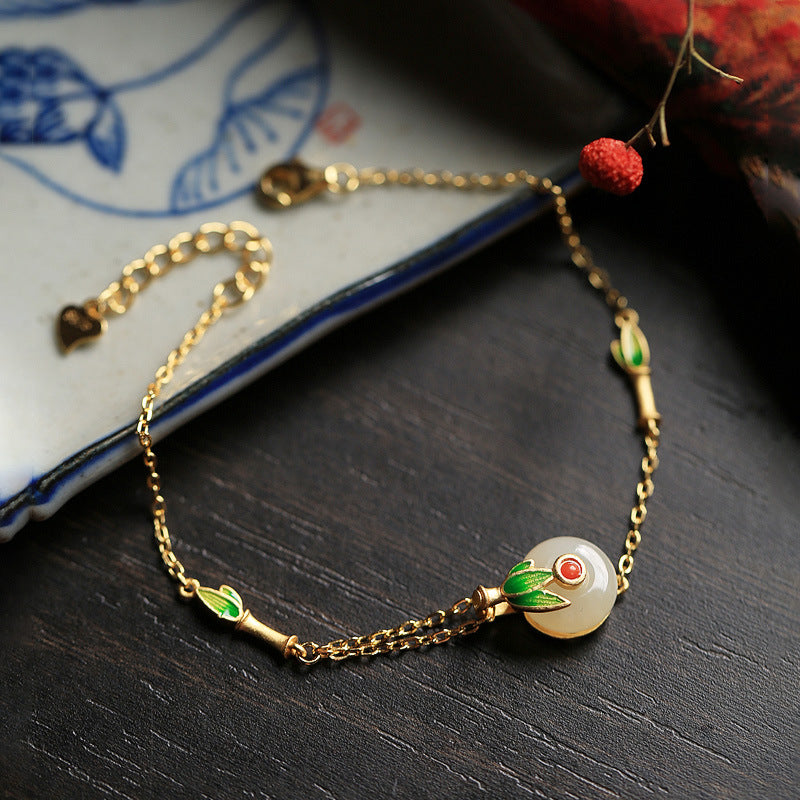 Pulsera de lujo ligero de estilo retro de hadas, de jade hetian con incrustaciones de oro antiguo y hebilla de la paz esmaltada.