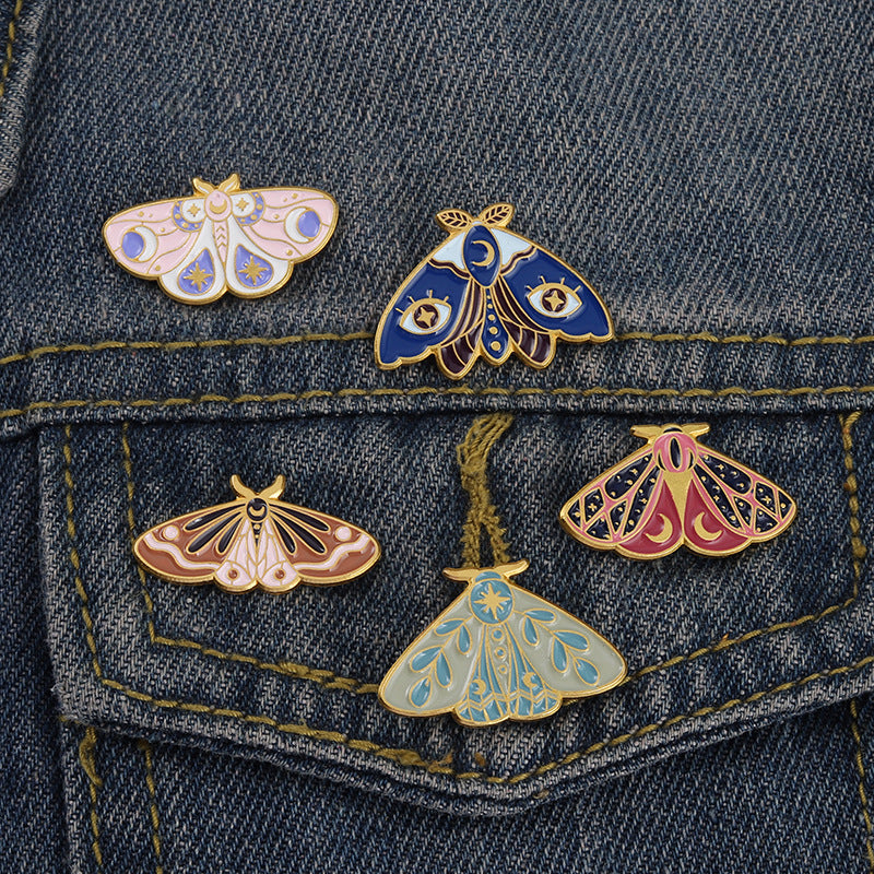 Broche de pintura con forma de mariposa y polilla con goteo de aceite creativo