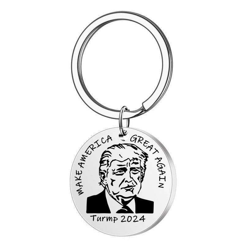 Llavero Trump de acero inoxidable redondo con letras y colgante