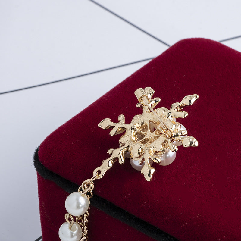 Broche de aleación de moda con cadena y copo de nieve