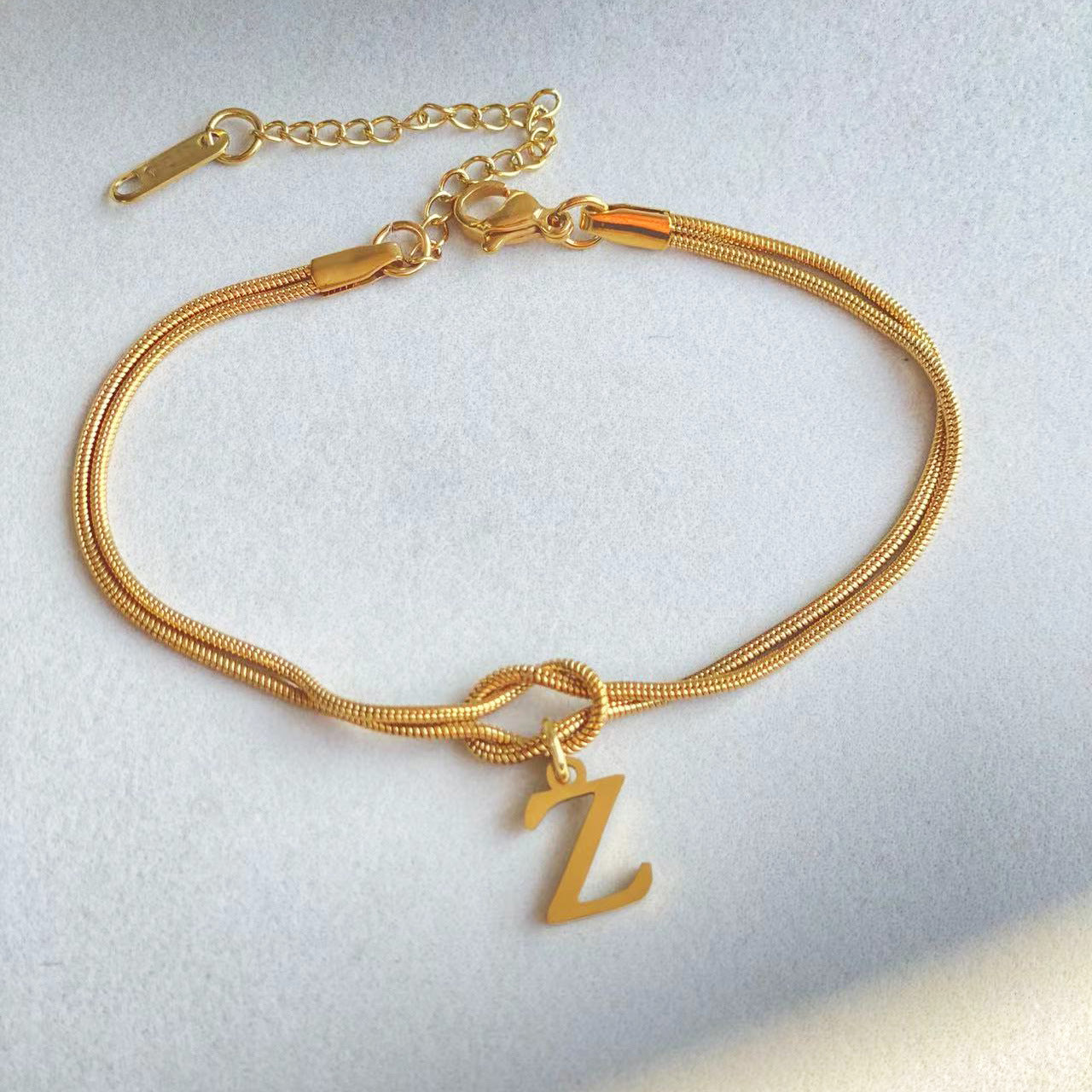 Nuevas pulseras con nudo de amor de la A a la Z para mujer, pulseras con dije de cadena de serpiente delicada de color dorado para parejas, joyería de acero inoxidable, regalo para el Día de San Valentín