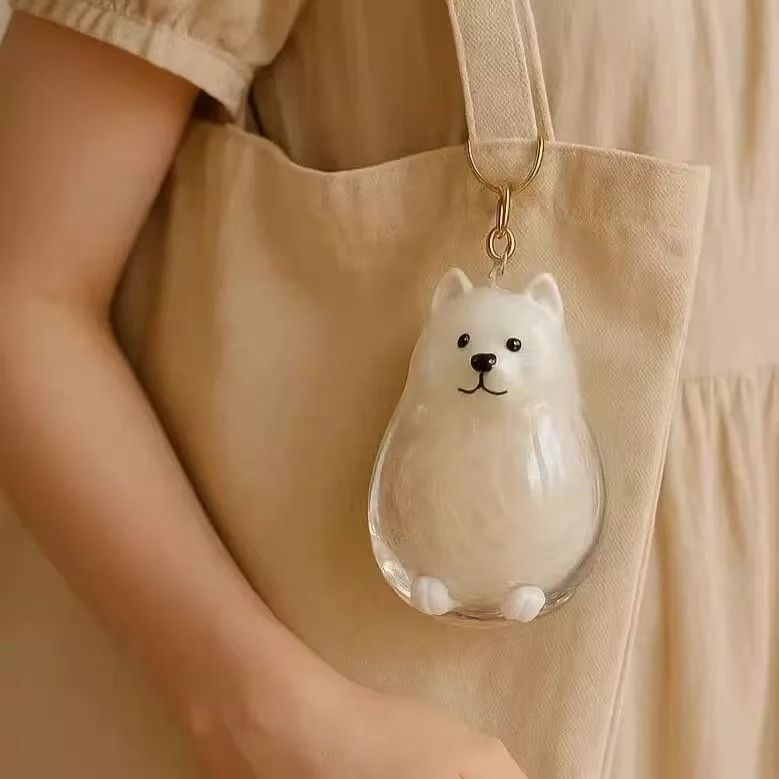 Llavero transparente para almacenamiento de pelo de mascota con colgante de bola peluda