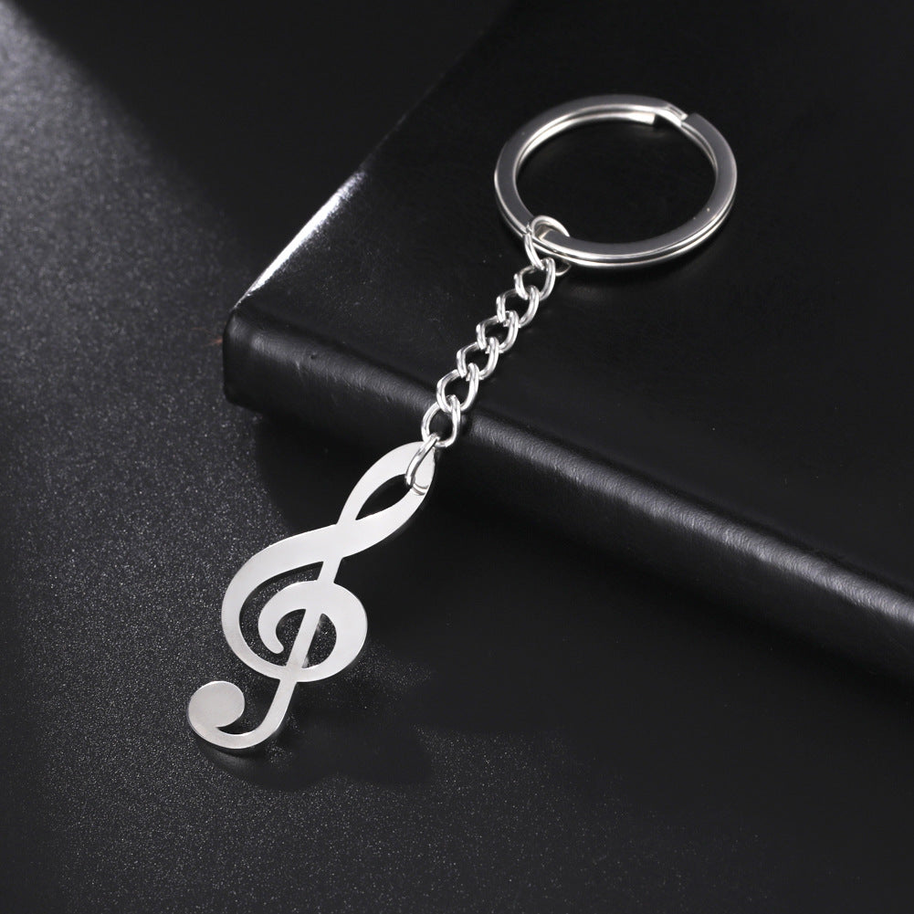 Llavero de acero inoxidable con colgante de nota musical para estudiantes de música, diseño versátil y amor por la música