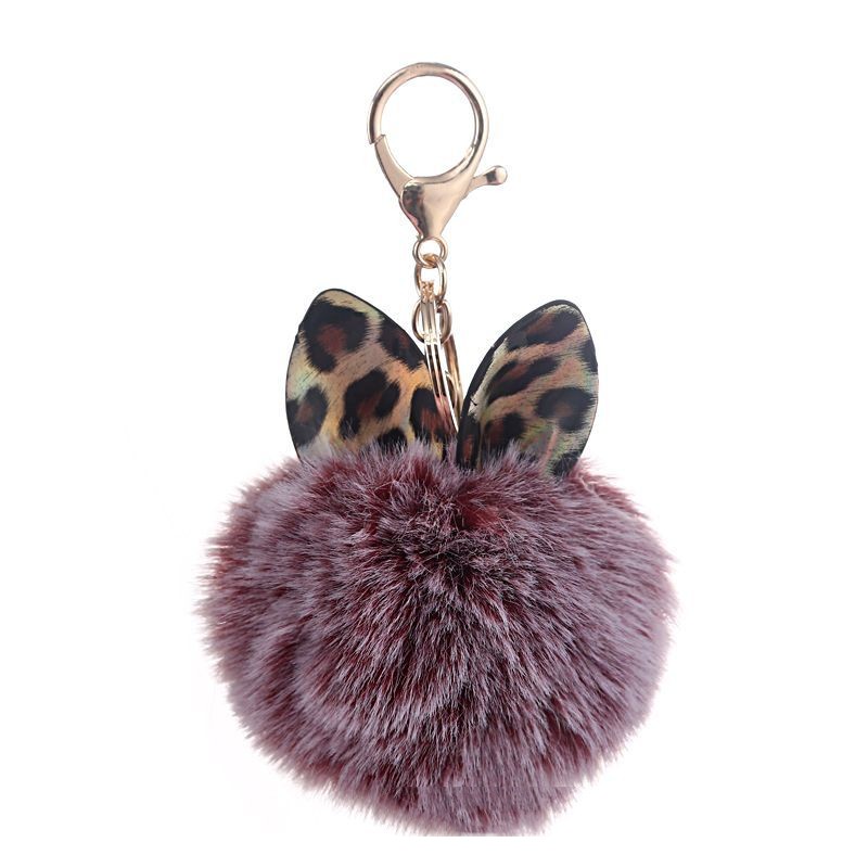 Llavero de bola de pelo con estampado de leopardo y orejas pequeñas