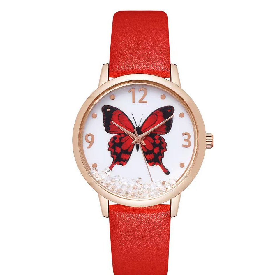 Reloj de cuarzo con diamantes de imitación y mariposa con números de moda para mujer