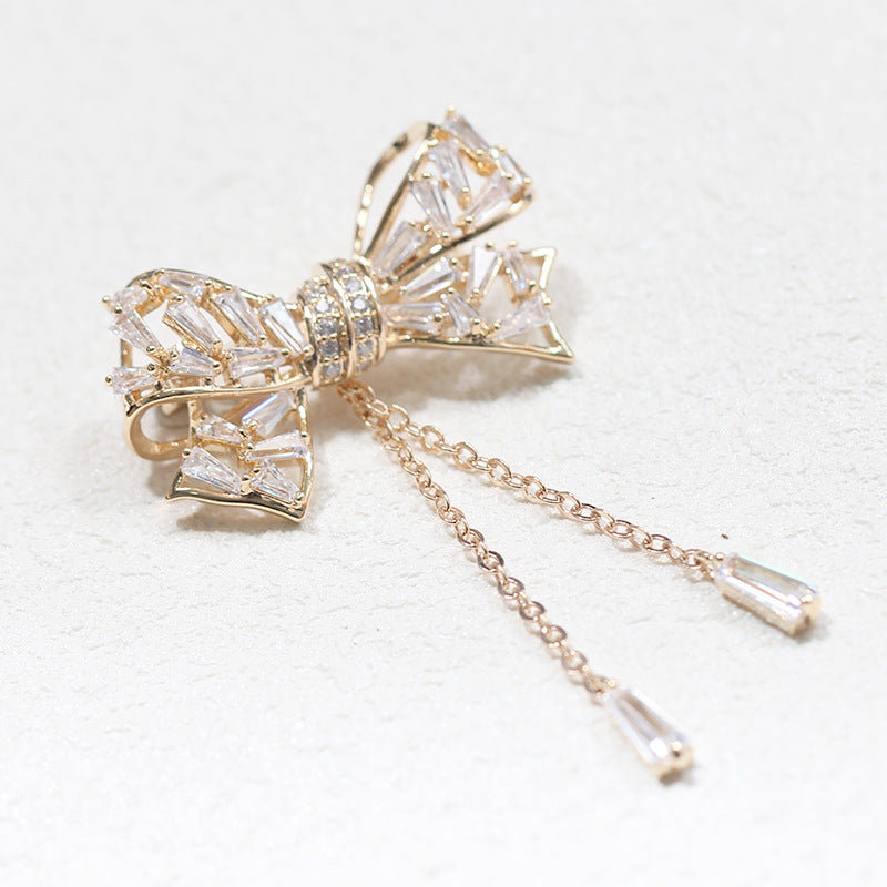 Broche tipo corsage para mujer, con incrustaciones de lazo, borla y temperamento sencillo