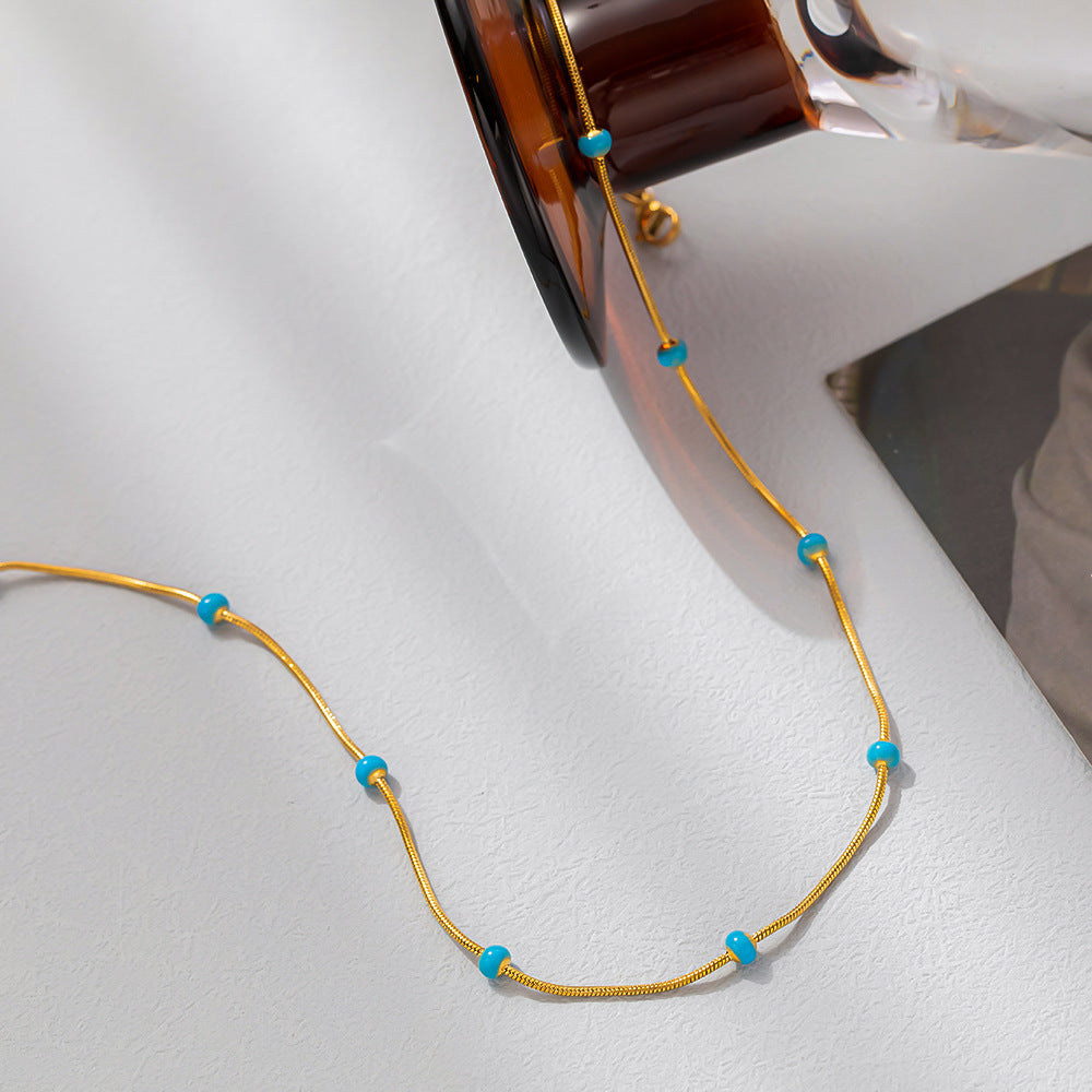 Collar de acero de titanio con bola esmaltada para mujer con un sentido incoloro y avanzado, accesorios de cadena de cuello simples y versátiles