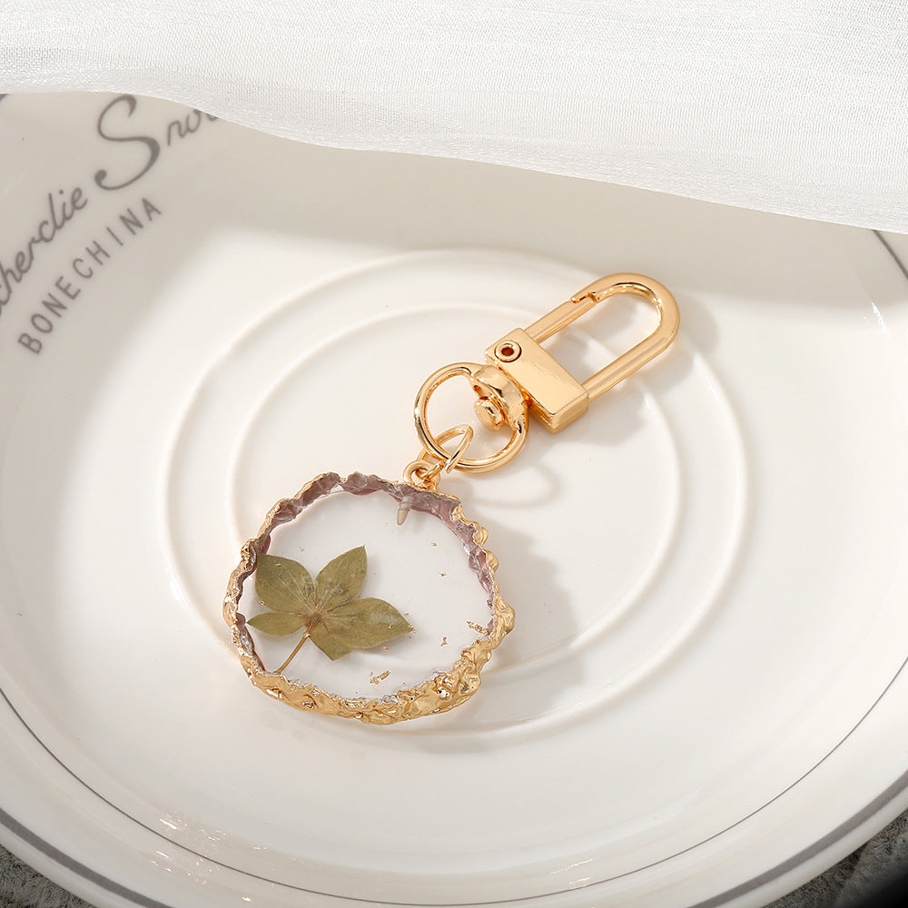 Colgantes para llaveros con flores de diciembre