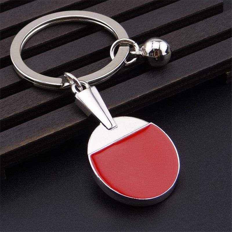 Llavero con forma de raqueta de tenis de mesa