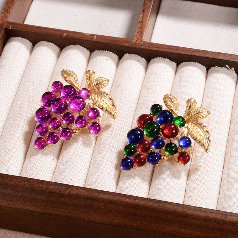Brosche im Retro-Stil, bunte lila Traubenform