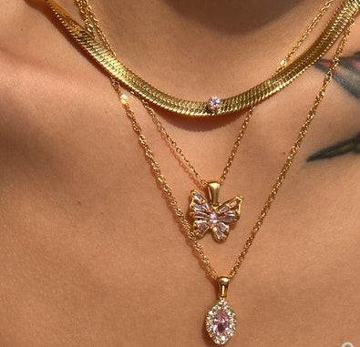 Collar de acero titanio con circonita ojo de caballo en forma de aceituna y perforación completa