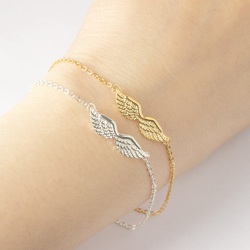 Nueva pulsera con dije de alas de ángel