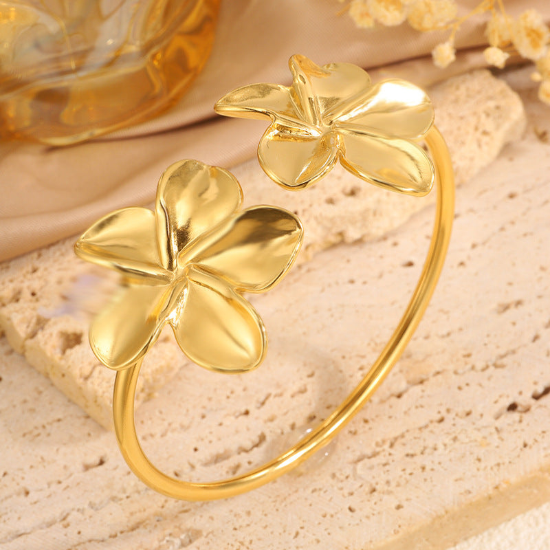 Pulsera de flor abierta de acero inoxidable