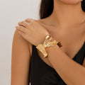 Design Liquid Pleated Cross Bracelet