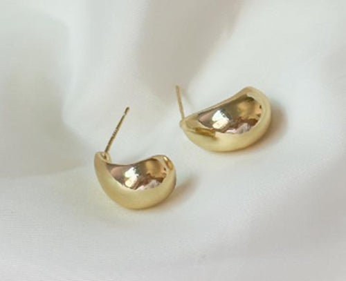 Pendientes de gota de agua de metal con un toque de lujo de nicho
