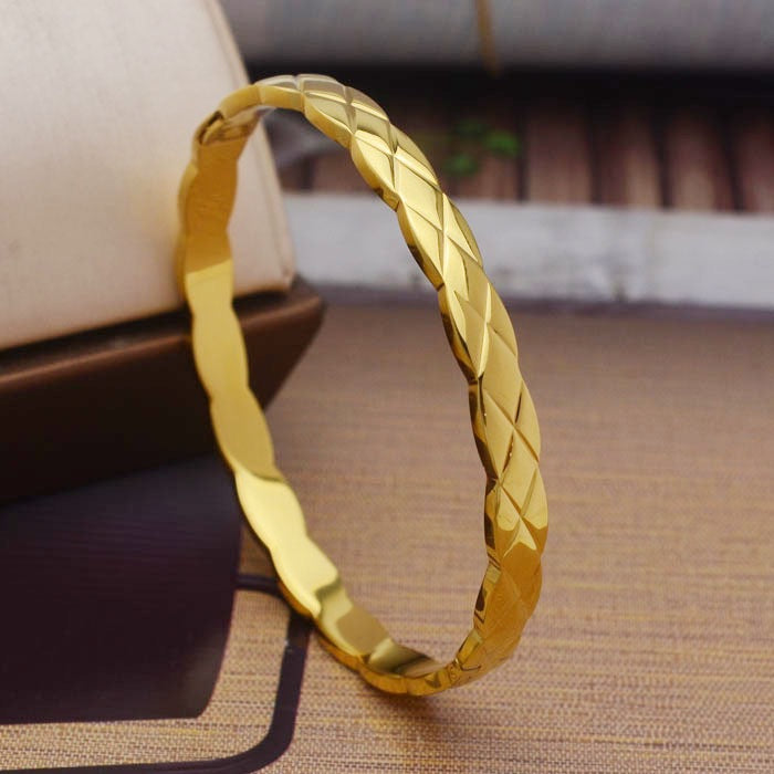 Pulsera francesa de oro y plata con diseño de diamantes calados