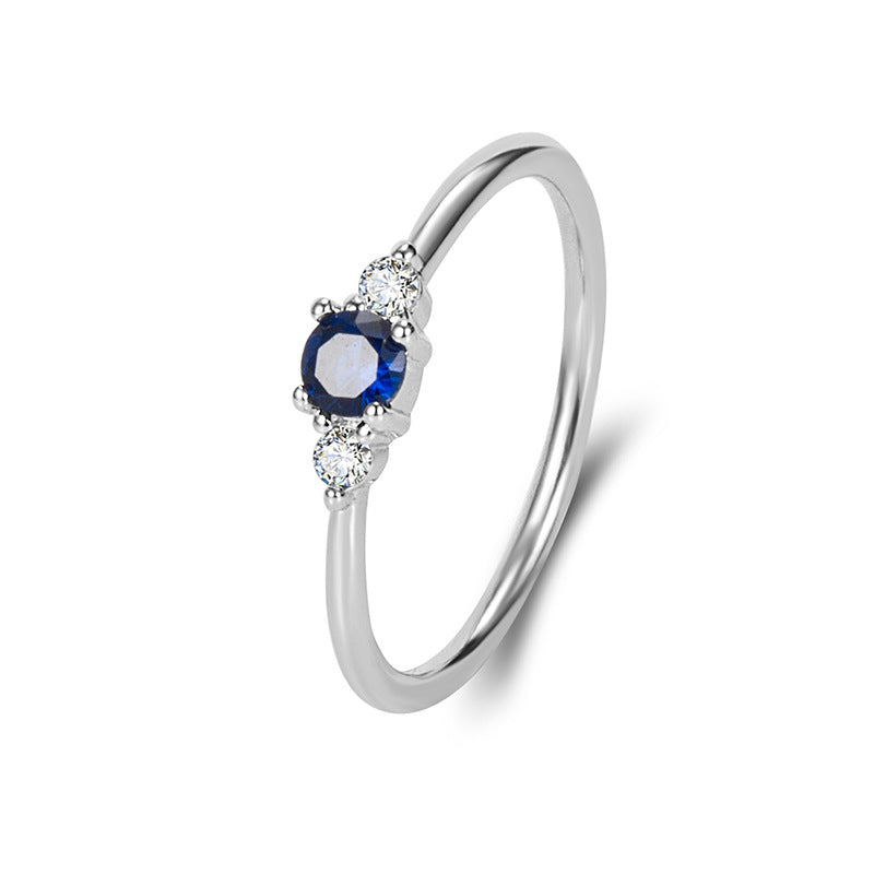 Exquisiter und kleiner blauer Diamant 14K Goldring leichter, einfacher Zirkon