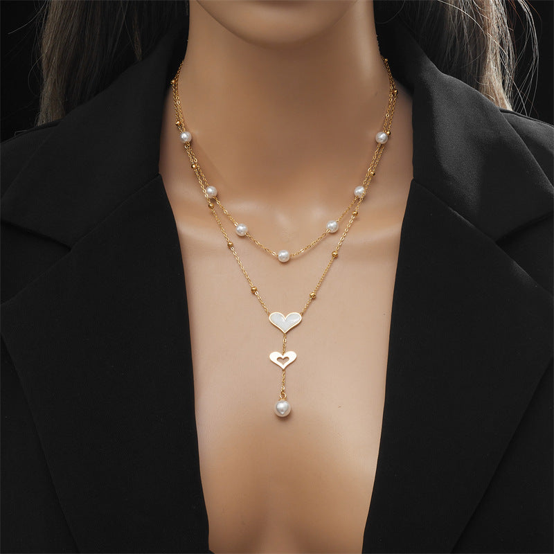 Ausgefallene Retro-Doppelschicht-Kette mit Perlen-Schmetterlings-Quasten-Anhänger-Halskette