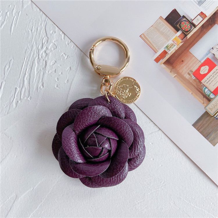 Llavero de coche de cuero con camelias de moda