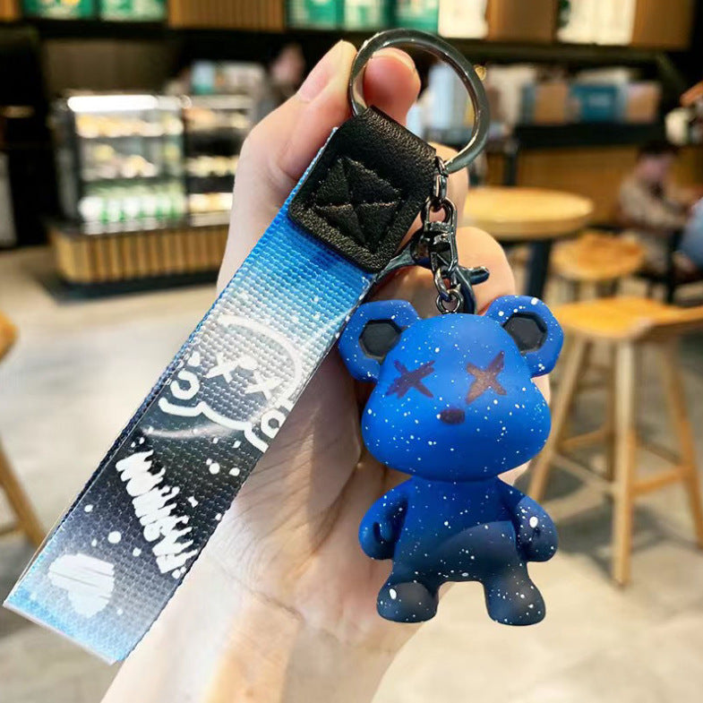 Llavero de gel de sílice con diseño de oso camaleón estrellado de dibujos animados