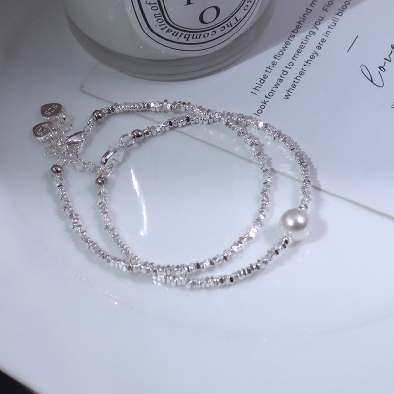 A Subtly Luxurious Niche-designed Bracelet Featuring A Few Pieces Of Silver