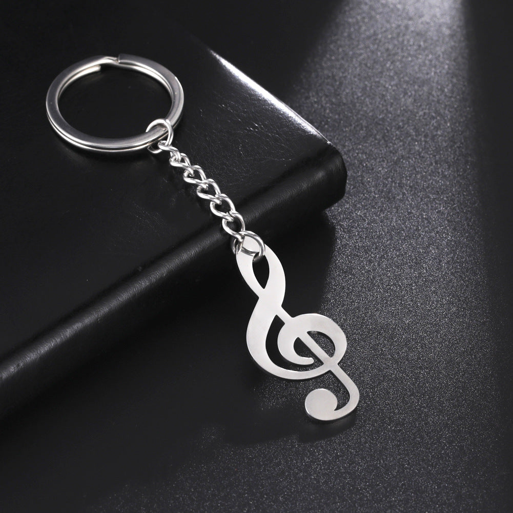 Llavero de acero inoxidable con colgante de nota musical para estudiantes de música, diseño versátil y amor por la música