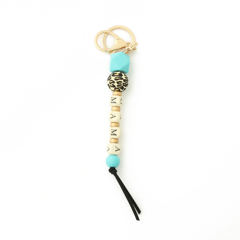 Llavero de cadena de leopardo con colgante de silicona con letras de madera y oblea