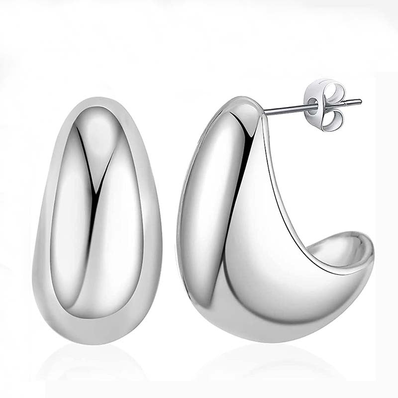 Pendientes de gota de agua de metal con un toque de lujo de nicho