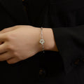 Pulsera versátil de acero de titanio chapado en oro de 18 quilates E124