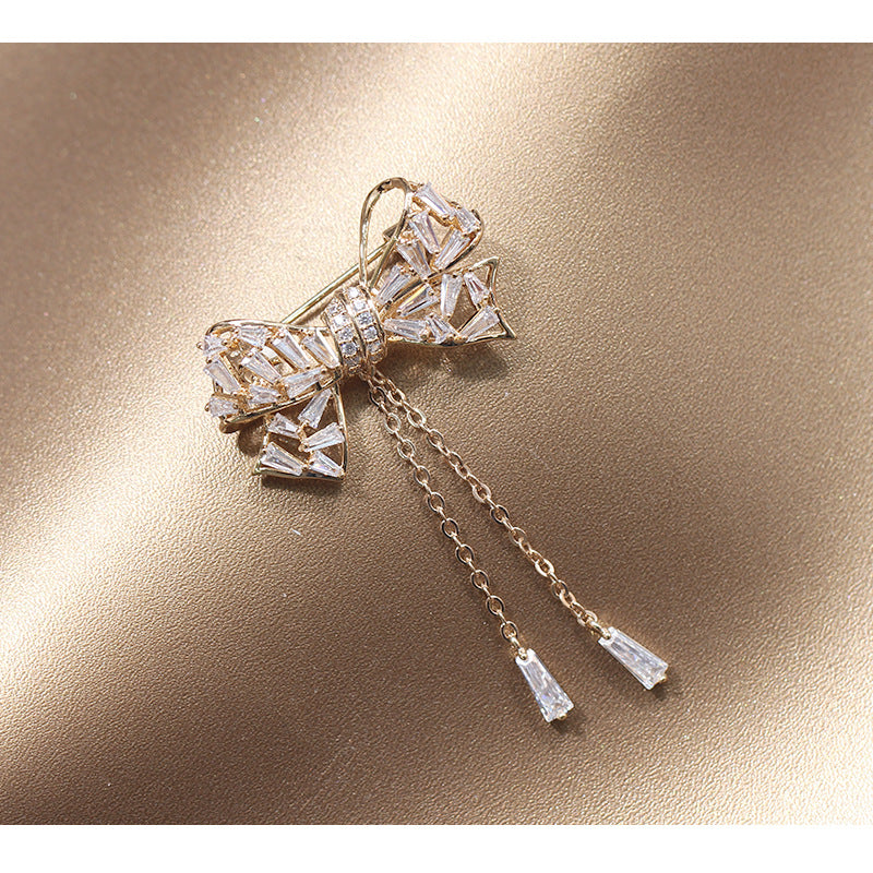 Broche tipo corsage para mujer, con incrustaciones de lazo, borla y temperamento sencillo