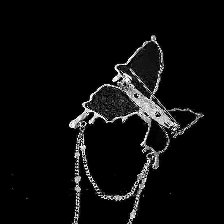 Broche con borlas de mariposa negro para mujer