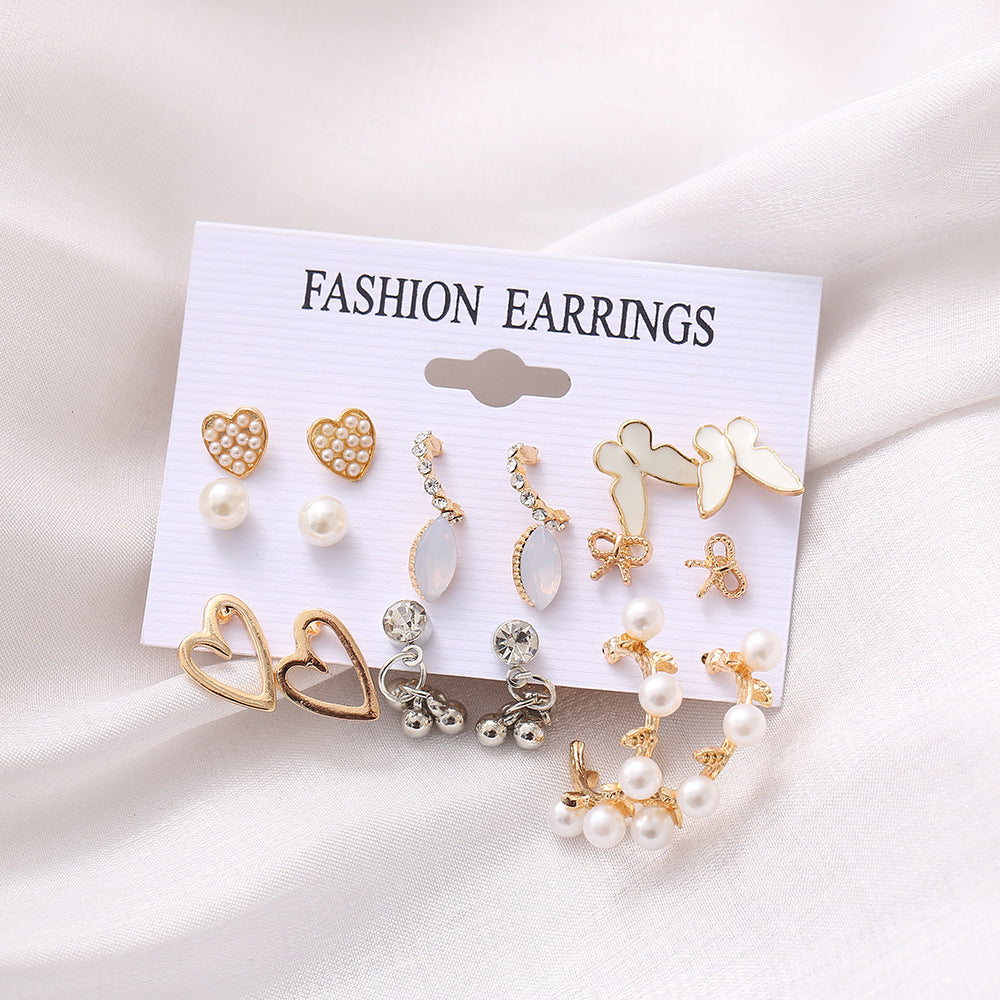Juego de aretes de 9 pares con diseño de mariposa y corazón calado