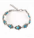 Pulsera elegante y versátil de metal con abalorios de palma bohemia
