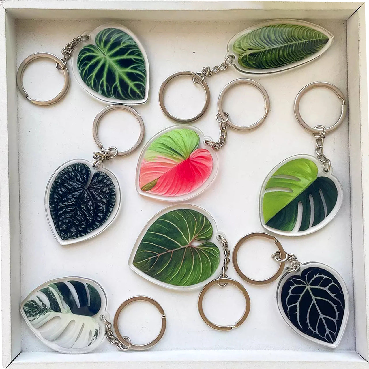 Llavero plano acrílico creativo con diseño de hoja de simulación
