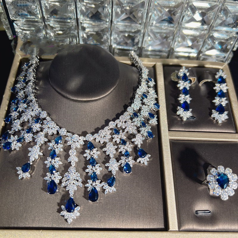 Blaues Strass-Zirkon-Quasten-Halsketten-Ohrring-Armband-Vierteiliges Set