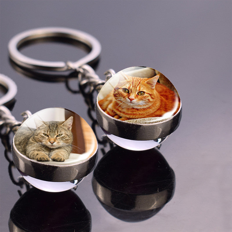 Colgante de bola de cristal con diseño de animales y llavero luminoso de moda