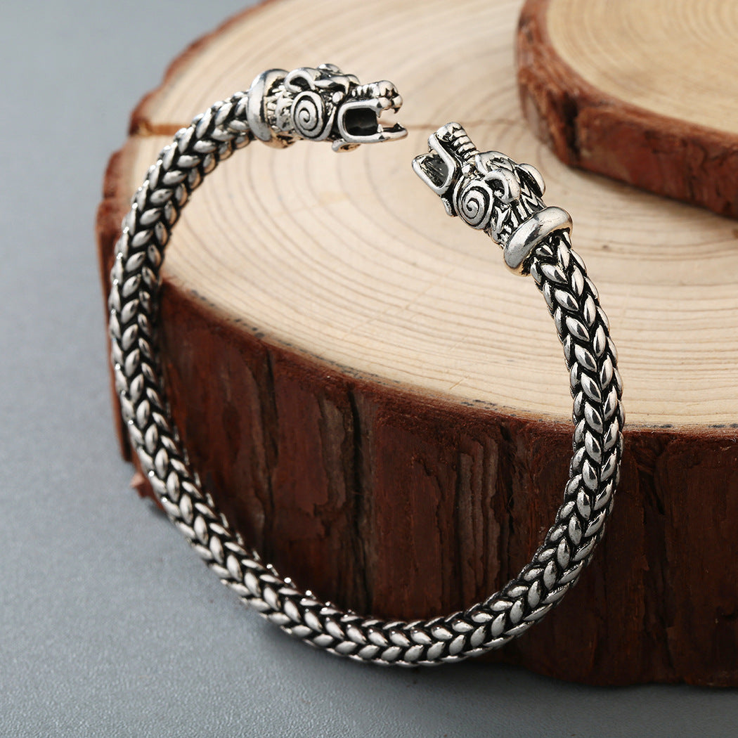 Asgard Crafted Brazalete torques de acero inoxidable hecho a mano con cabeza de lobo gris