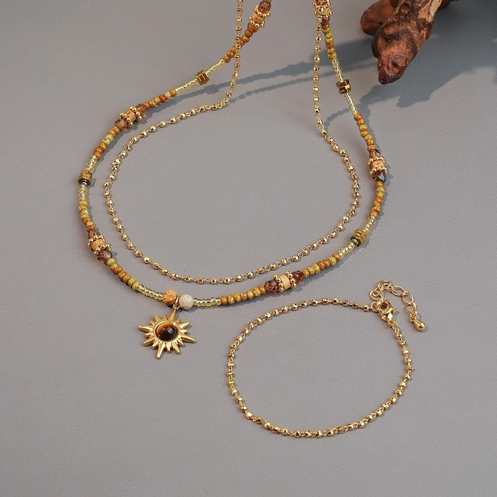 Halskette und Armband aus böhmischen Tigeraugenperlen im Retro-Stil