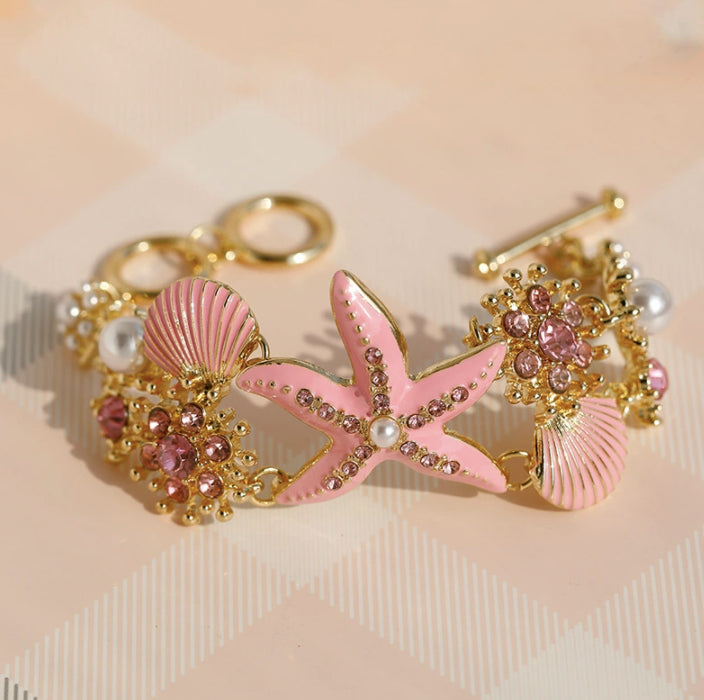 Pulsera de niña con diseño de estrellas de mar, concha y diamantes de imitación