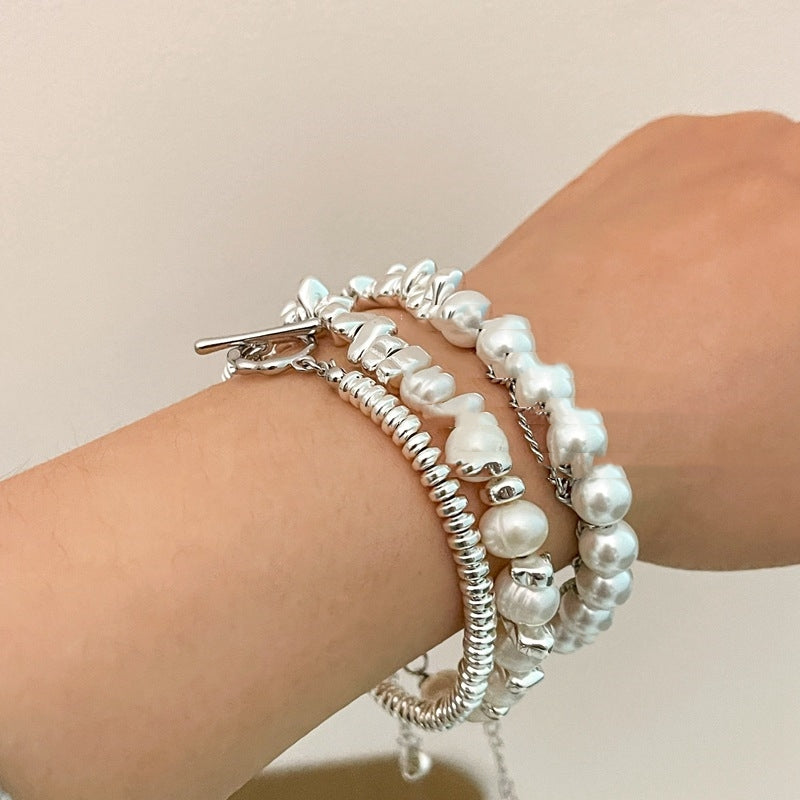 Pulsera de perlas con hebilla OT de viento frío con cuentas de nicho de diseño
