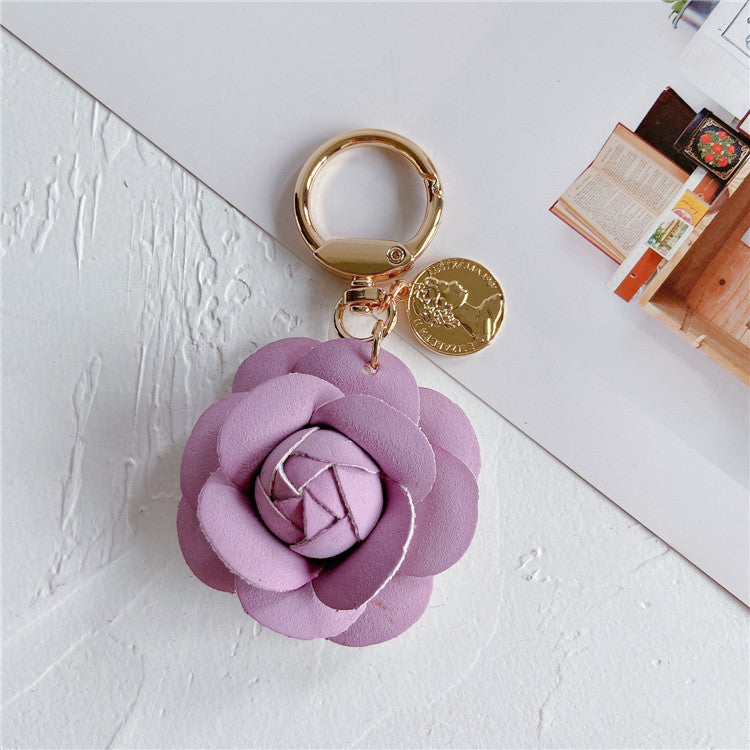 Llavero de coche de cuero con camelias de moda