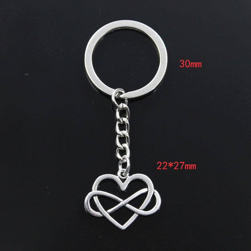 Llavero con forma de corazón ahuecado en forma de ocho para hombre y mujer