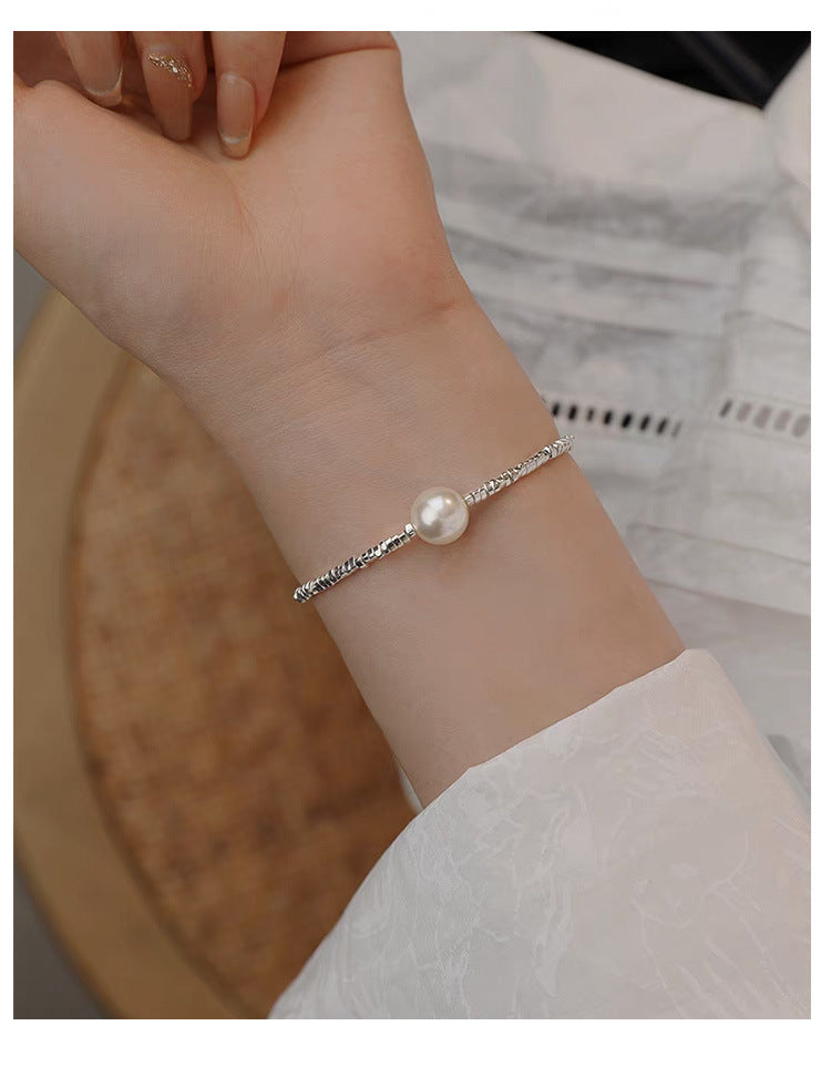 A Subtly Luxurious Niche-designed Bracelet Featuring A Few Pieces Of Silver