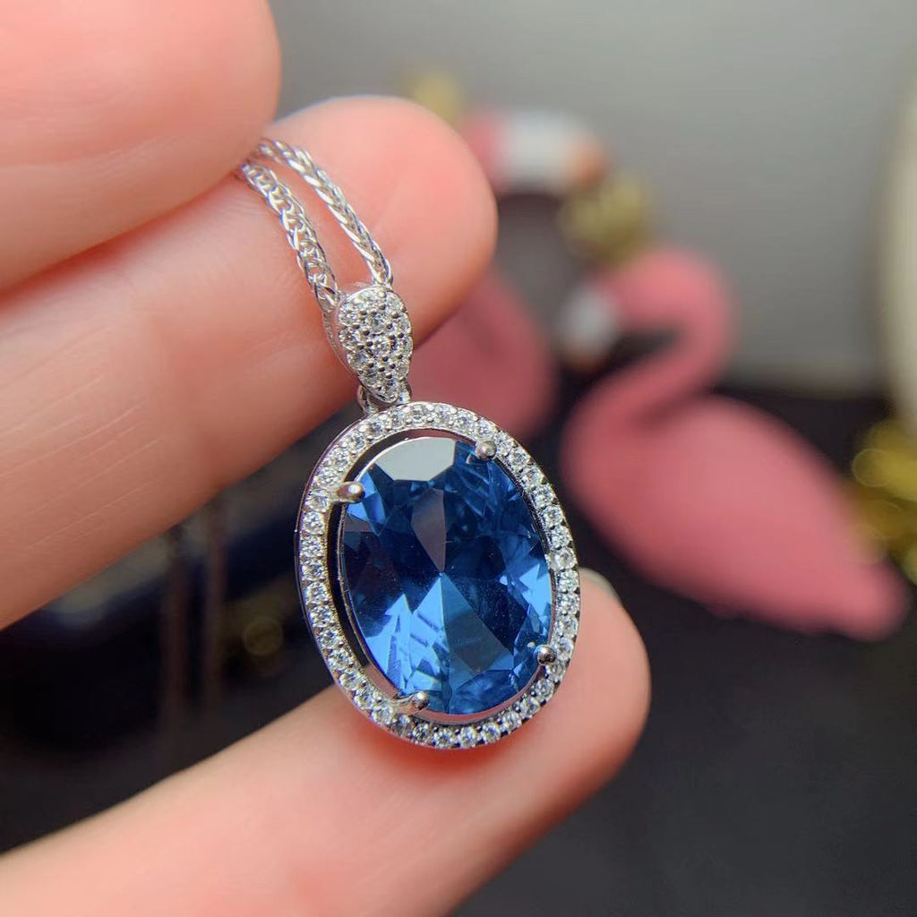 Juego de anillos y colgante de topacio azul de Londres con incrustaciones de plata 925. Se entrega un juego.
